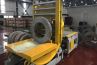 coil tilter with conveyor
